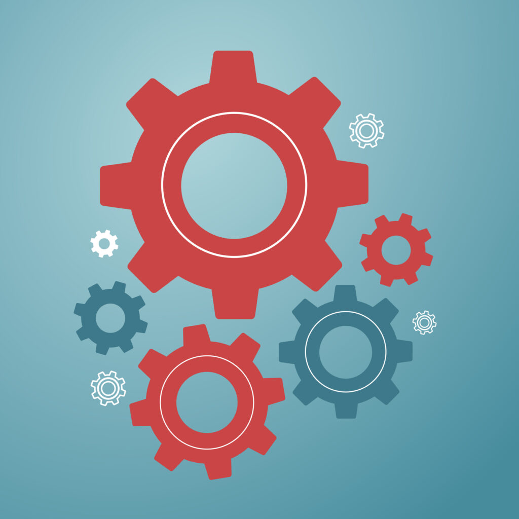 Abstract illustration of interlocking red and blue gears symbolizing teamwork, mechanics, and innovation